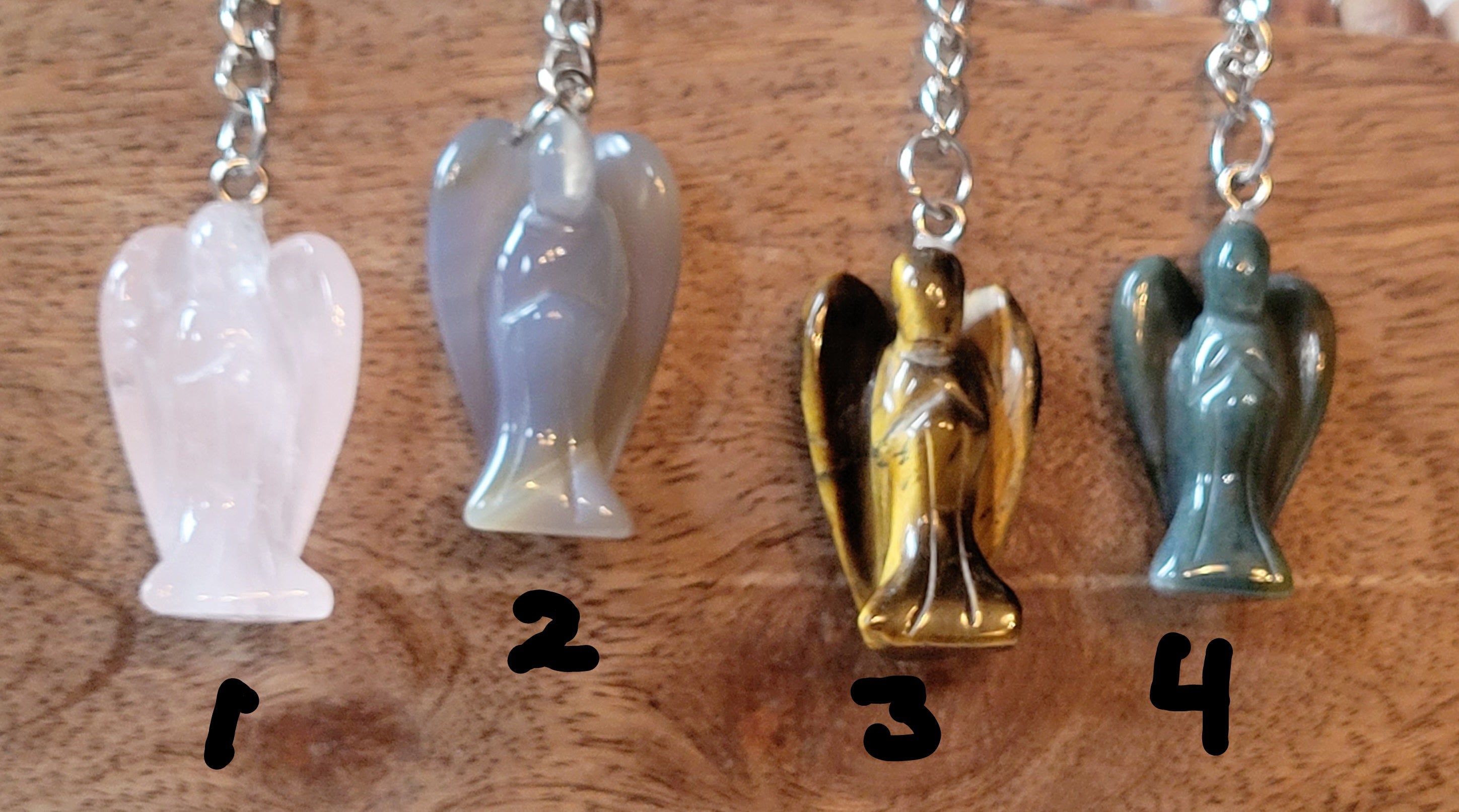 Keychains, Stone Keychains, Crystal Keychains, Crystal Carvings, Skulls, Elephants, Hamsa, Hearts, Etc.